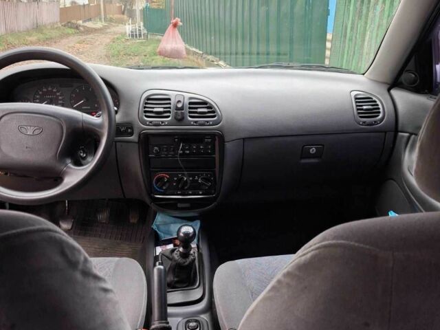 Белый Дэу Лачетти, объемом двигателя 1.6 л и пробегом 171 тыс. км за 2500 $, фото 5 на Automoto.ua