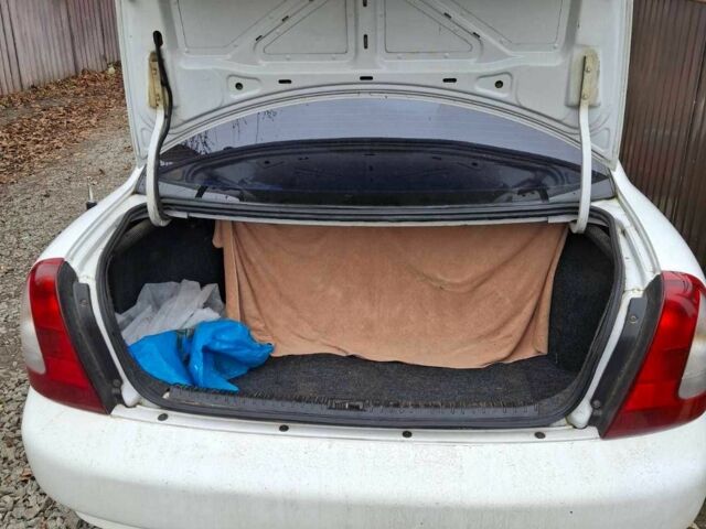 Белый Дэу Лачетти, объемом двигателя 1.6 л и пробегом 171 тыс. км за 2500 $, фото 14 на Automoto.ua