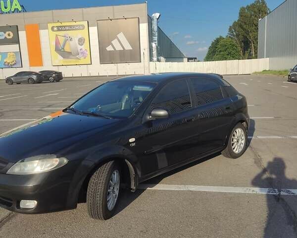 Черный Дэу Лачетти, объемом двигателя 1.8 л и пробегом 297 тыс. км за 4200 $, фото 6 на Automoto.ua