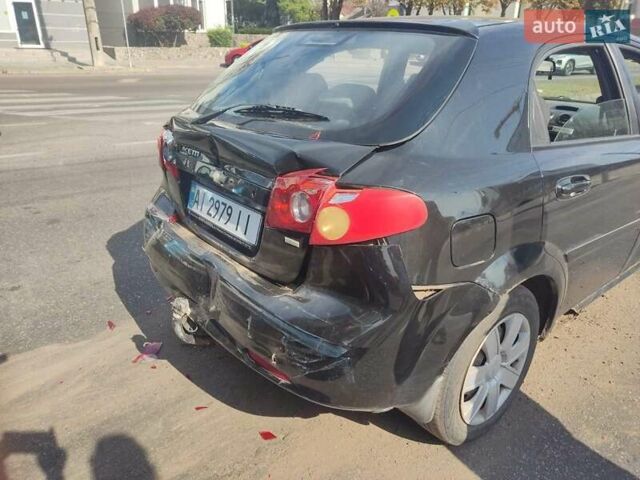 Чорний Деу Лачетті, об'ємом двигуна 1.4 л та пробігом 320 тис. км за 2000 $, фото 8 на Automoto.ua
