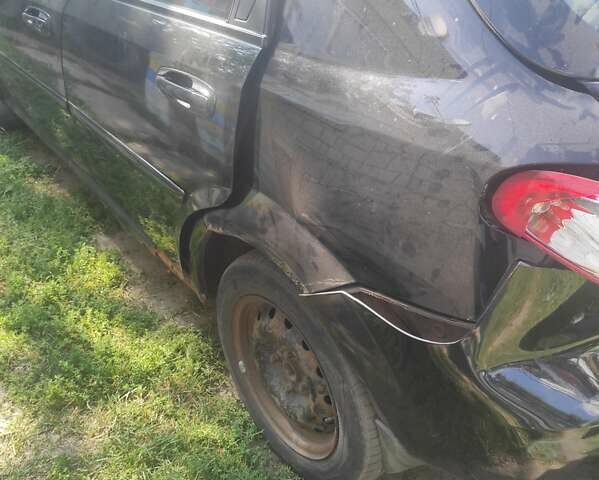 Чорний Деу Лачетті, об'ємом двигуна 1.4 л та пробігом 320 тис. км за 2000 $, фото 3 на Automoto.ua