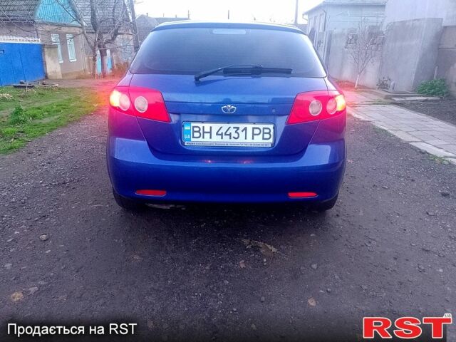 Синий Дэу Лачетти, объемом двигателя 1.4 л и пробегом 162 тыс. км за 3400 $, фото 5 на Automoto.ua