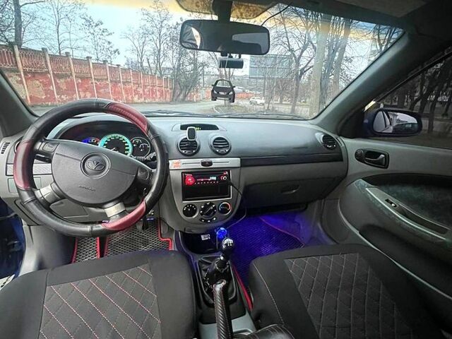 Синий Дэу Лачетти, объемом двигателя 1.4 л и пробегом 150 тыс. км за 4000 $, фото 1 на Automoto.ua