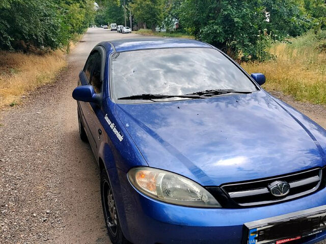 Синий Дэу Лачетти, объемом двигателя 1.4 л и пробегом 150 тыс. км за 4500 $, фото 1 на Automoto.ua