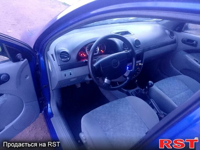 Синий Дэу Лачетти, объемом двигателя 1.4 л и пробегом 162 тыс. км за 3400 $, фото 4 на Automoto.ua