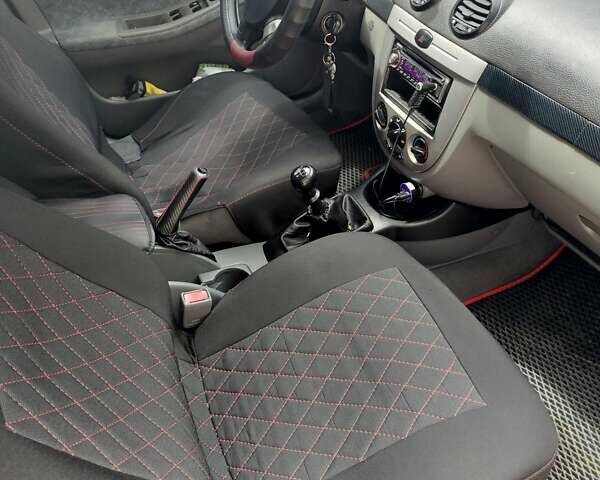 Синий Дэу Лачетти, объемом двигателя 1.4 л и пробегом 250 тыс. км за 3999 $, фото 1 на Automoto.ua