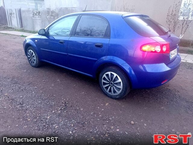 Синий Дэу Лачетти, объемом двигателя 1.4 л и пробегом 162 тыс. км за 3400 $, фото 3 на Automoto.ua