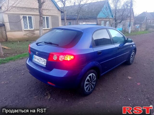 Синий Дэу Лачетти, объемом двигателя 1.4 л и пробегом 162 тыс. км за 3400 $, фото 2 на Automoto.ua