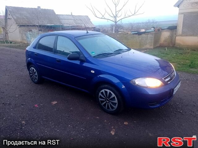 Синий Дэу Лачетти, объемом двигателя 1.4 л и пробегом 162 тыс. км за 3400 $, фото 1 на Automoto.ua