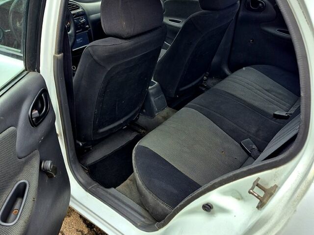 Белый Дэу Ланос, объемом двигателя 1.5 л и пробегом 220 тыс. км за 1850 $, фото 7 на Automoto.ua