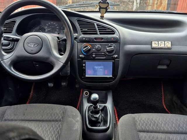 Белый Дэу Ланос, объемом двигателя 1.5 л и пробегом 220 тыс. км за 1850 $, фото 6 на Automoto.ua