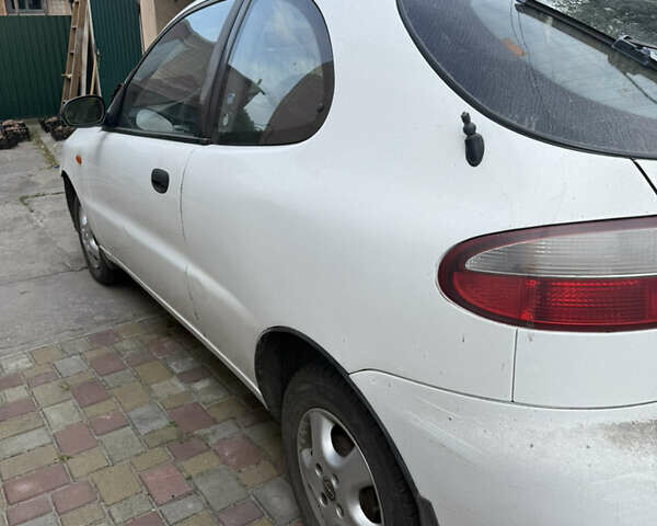Белый Дэу Ланос, объемом двигателя 1.5 л и пробегом 383 тыс. км за 1500 $, фото 2 на Automoto.ua