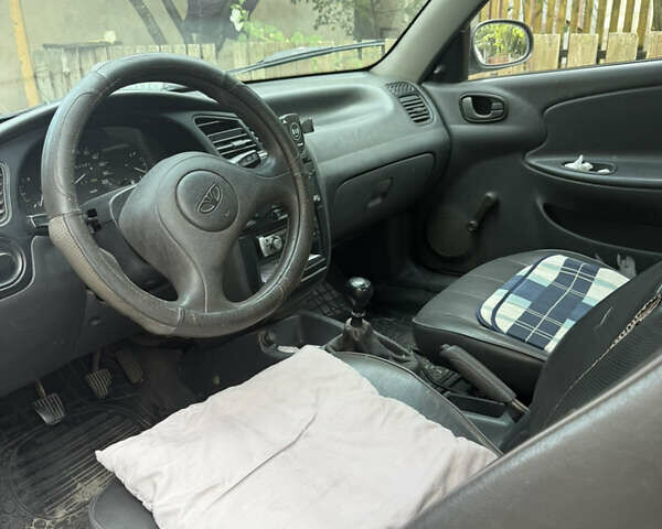 Белый Дэу Ланос, объемом двигателя 1.5 л и пробегом 383 тыс. км за 1500 $, фото 9 на Automoto.ua