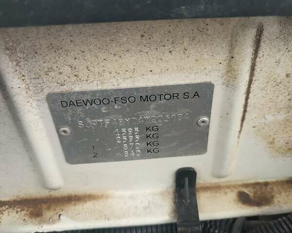 Белый Дэу Ланос, объемом двигателя 1.5 л и пробегом 196 тыс. км за 3500 $, фото 29 на Automoto.ua
