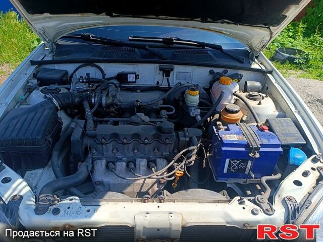 Білий Деу Ланос, об'ємом двигуна 1.5 л та пробігом 127 тис. км за 2350 $, фото 1 на Automoto.ua