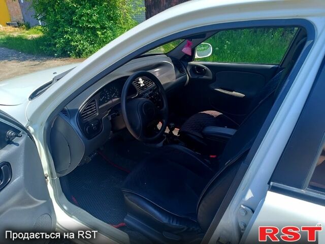 Білий Деу Ланос, об'ємом двигуна 1.5 л та пробігом 127 тис. км за 2350 $, фото 7 на Automoto.ua