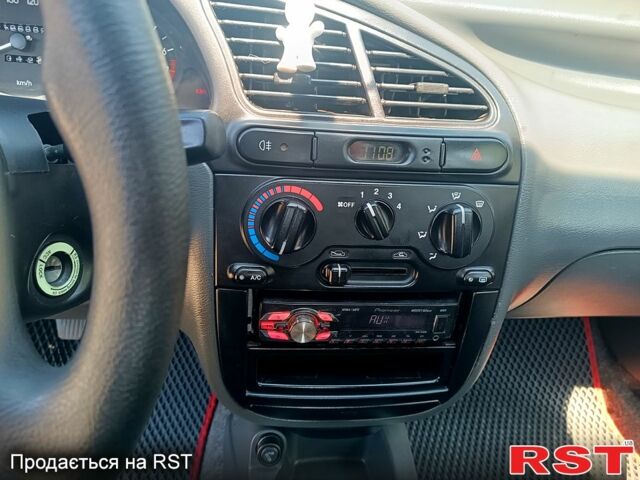 Білий Деу Ланос, об'ємом двигуна 1.5 л та пробігом 127 тис. км за 2350 $, фото 5 на Automoto.ua