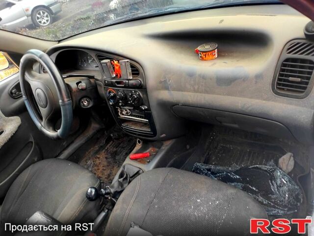 Белый Дэу Ланос, объемом двигателя 1.5 л и пробегом 300 тыс. км за 800 $, фото 5 на Automoto.ua