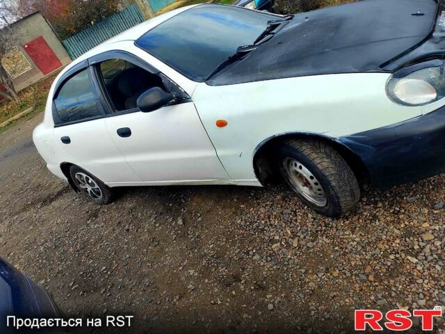 Белый Дэу Ланос, объемом двигателя 1.5 л и пробегом 300 тыс. км за 800 $, фото 2 на Automoto.ua