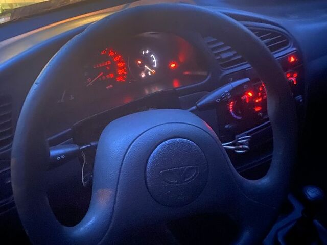 Белый Дэу Ланос, объемом двигателя 1.5 л и пробегом 200 тыс. км за 1000 $, фото 12 на Automoto.ua