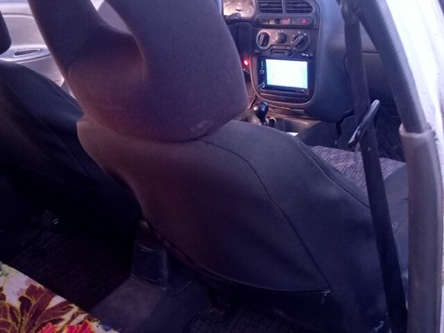 Белый Дэу Ланос, объемом двигателя 1.5 л и пробегом 365 тыс. км за 1200 $, фото 5 на Automoto.ua