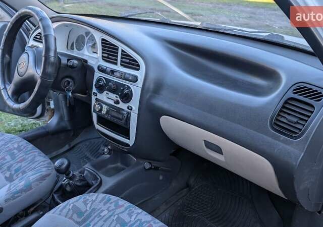 Дэу Ланос 1998 в Шепетовке на Automoto.ua Белый Дэу Ланос, объемом двигателя 1.5 л и пробегом 149 тыс. км за 1000 $, фото 4 на Automoto.ua
