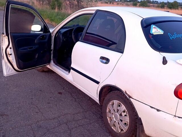 Белый Дэу Ланос, объемом двигателя 1.5 л и пробегом 365 тыс. км за 1200 $, фото 3 на Automoto.ua