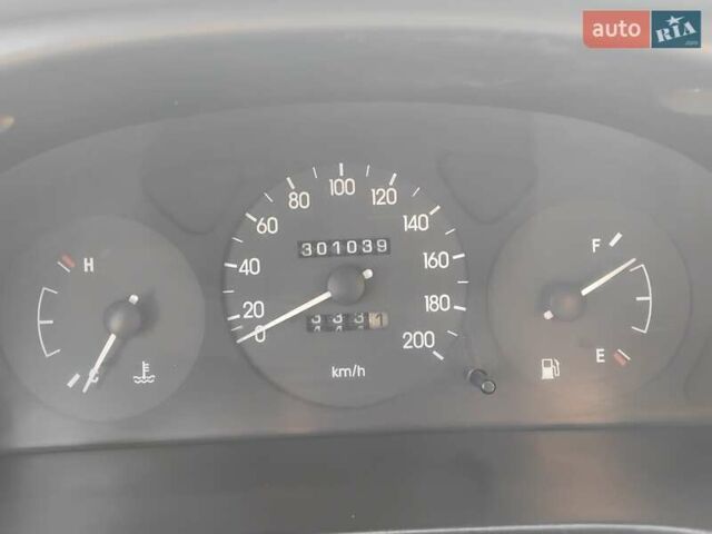 Білий Деу Ланос, об'ємом двигуна 1.5 л та пробігом 301 тис. км за 1750 $, фото 11 на Automoto.ua