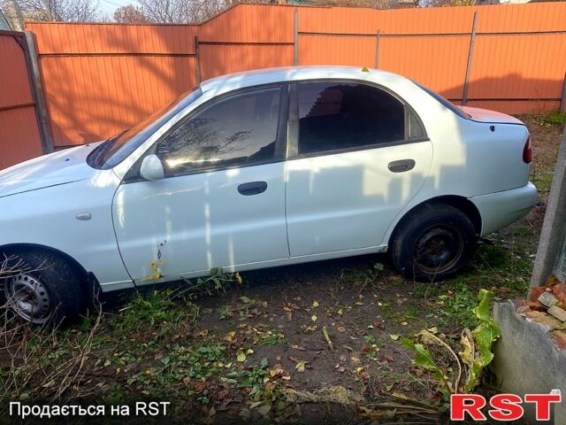 Белый Дэу Ланос, объемом двигателя 1.5 л и пробегом 200 тыс. км за 1000 $, фото 1 на Automoto.ua