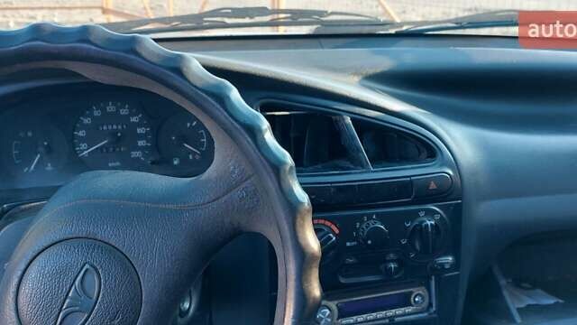 Белый Дэу Ланос, объемом двигателя 1.5 л и пробегом 570 тыс. км за 1200 $, фото 9 на Automoto.ua