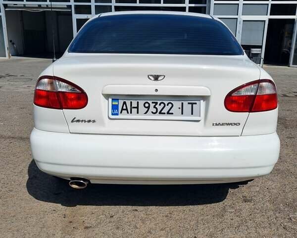 Белый Дэу Ланос, объемом двигателя 1.6 л и пробегом 320 тыс. км за 3500 $, фото 2 на Automoto.ua