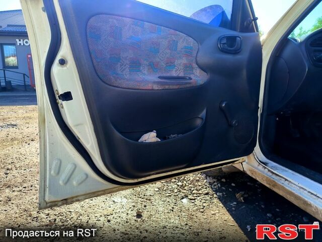 Белый Дэу Ланос, объемом двигателя 1.5 л и пробегом 370 тыс. км за 2000 $, фото 6 на Automoto.ua