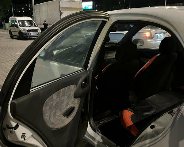 Белый Дэу Ланос, объемом двигателя 1.5 л и пробегом 340 тыс. км за 1400 $, фото 11 на Automoto.ua