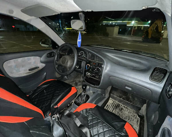 Белый Дэу Ланос, объемом двигателя 1.5 л и пробегом 340 тыс. км за 1400 $, фото 12 на Automoto.ua