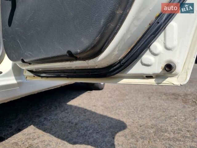 Белый Дэу Ланос, объемом двигателя 1.6 л и пробегом 320 тыс. км за 3500 $, фото 9 на Automoto.ua