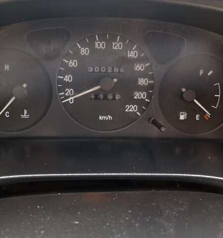 Білий Деу Ланос, об'ємом двигуна 1.5 л та пробігом 304 тис. км за 2100 $, фото 4 на Automoto.ua