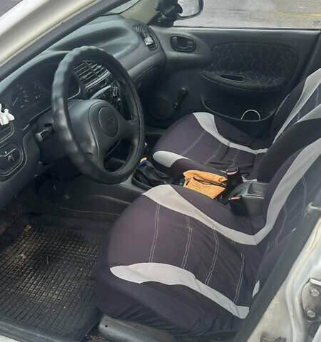 Білий Деу Ланос, об'ємом двигуна 1.5 л та пробігом 556 тис. км за 1800 $, фото 9 на Automoto.ua