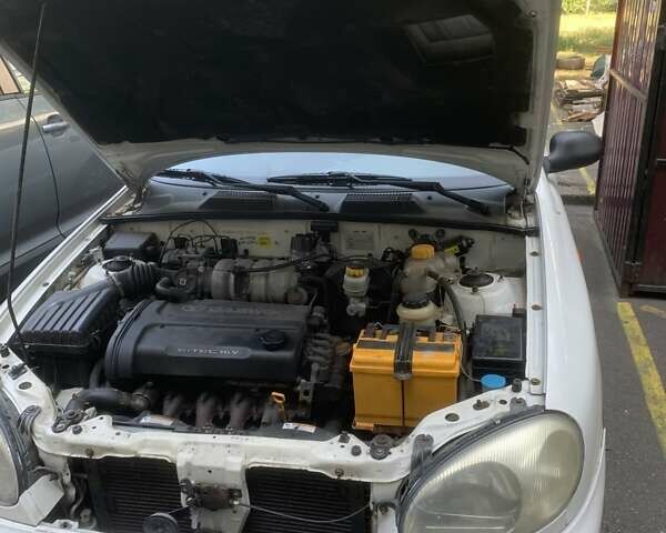 Белый Дэу Ланос, объемом двигателя 1.6 л и пробегом 220 тыс. км за 1600 $, фото 6 на Automoto.ua