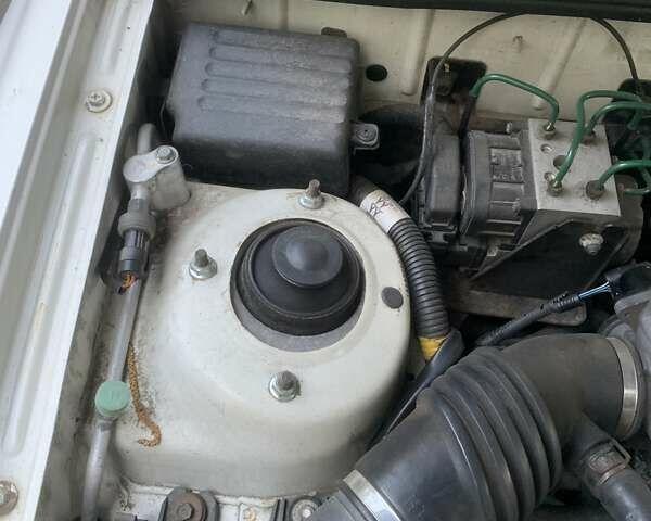 Белый Дэу Ланос, объемом двигателя 1.6 л и пробегом 220 тыс. км за 1600 $, фото 8 на Automoto.ua