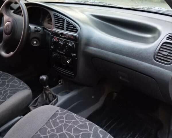 Белый Дэу Ланос, объемом двигателя 1.5 л и пробегом 185 тыс. км за 1800 $, фото 7 на Automoto.ua