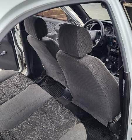 Дэу Ланос 2003 в Днепре (Днепропетровске) на Automoto.ua Белый Дэу Ланос, объемом двигателя 1.5 л и пробегом 338 тыс. км за 2200 $, фото 7 на Automoto.ua