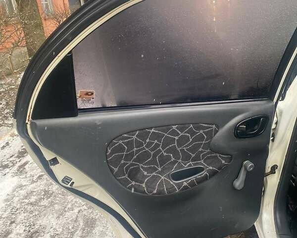 Белый Дэу Ланос, объемом двигателя 1.5 л и пробегом 255 тыс. км за 1500 $, фото 7 на Automoto.ua