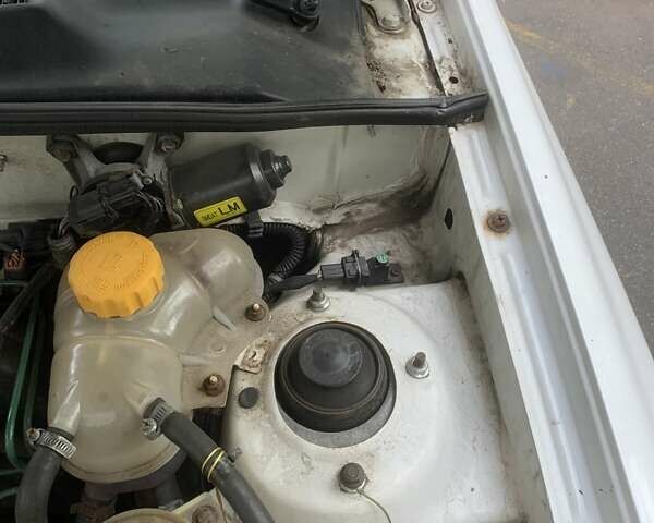 Белый Дэу Ланос, объемом двигателя 1.6 л и пробегом 220 тыс. км за 1600 $, фото 7 на Automoto.ua