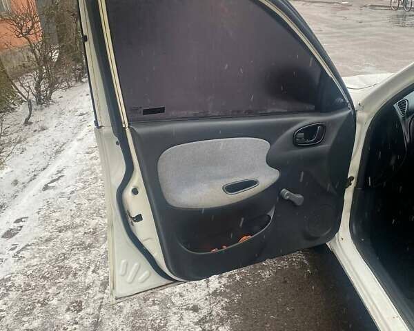 Белый Дэу Ланос, объемом двигателя 1.5 л и пробегом 255 тыс. км за 1500 $, фото 8 на Automoto.ua