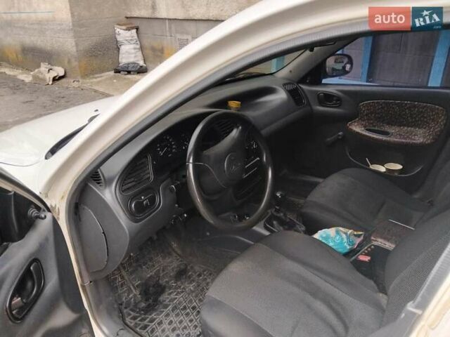 Белый Дэу Ланос, объемом двигателя 1.5 л и пробегом 397 тыс. км за 1900 $, фото 1 на Automoto.ua