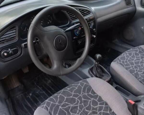 Белый Дэу Ланос, объемом двигателя 1.5 л и пробегом 185 тыс. км за 1800 $, фото 6 на Automoto.ua