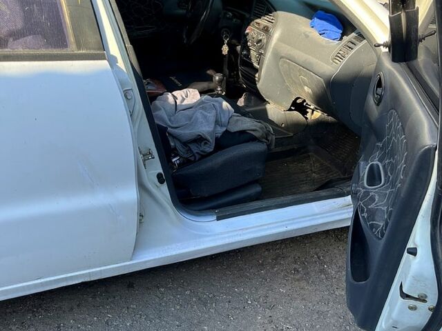 Білий Деу Ланос, об'ємом двигуна 1.5 л та пробігом 250 тис. км за 770 $, фото 3 на Automoto.ua