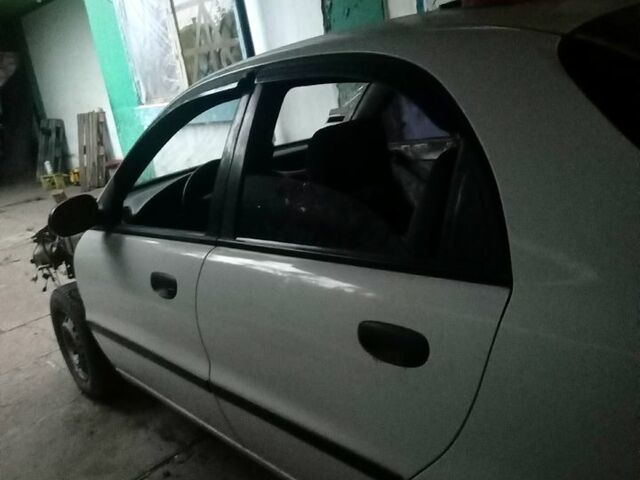 Білий Деу Ланос, об'ємом двигуна 1.5 л та пробігом 200 тис. км за 1000 $, фото 2 на Automoto.ua