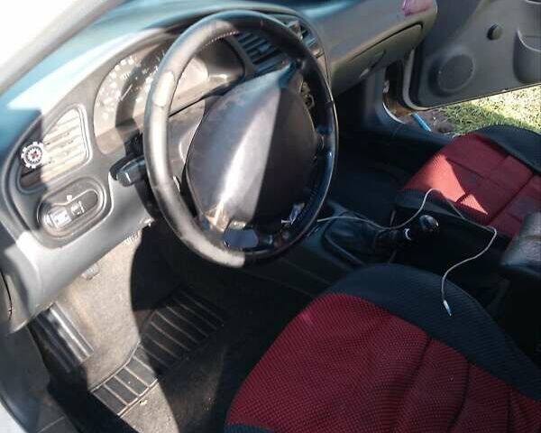 Белый Дэу Ланос, объемом двигателя 1.5 л и пробегом 420 тыс. км за 2350 $, фото 1 на Automoto.ua