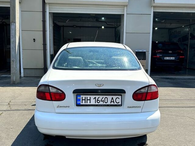 Белый Дэу Ланос, объемом двигателя 1.5 л и пробегом 245 тыс. км за 2200 $, фото 3 на Automoto.ua